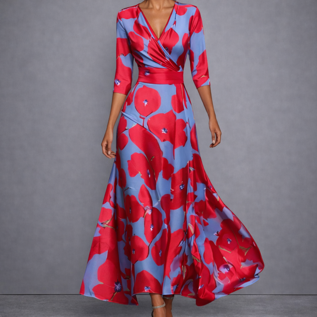 Robe longue élégante Margaret de Danoir Paris avec motif floral blanc et bleu, idéale pour une tenue sophistiquée.