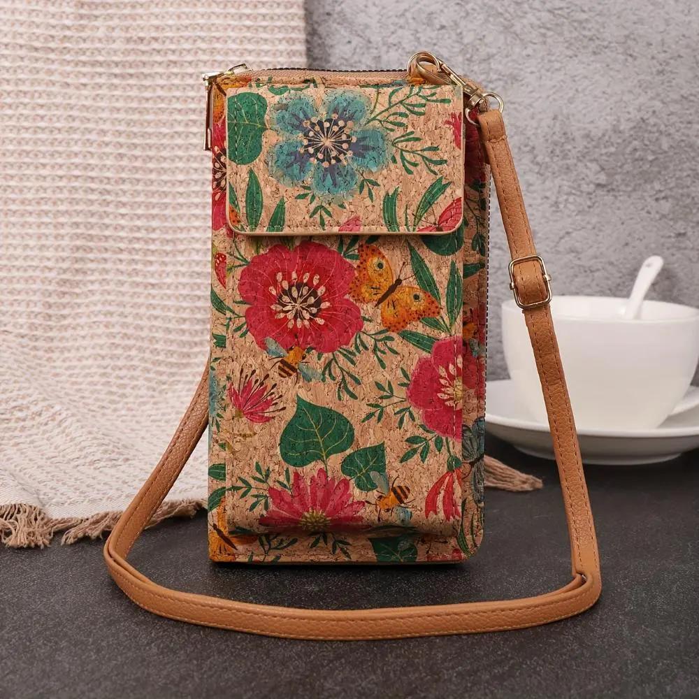 Sac à bandoulière Nina Danoir Paris avec motif floral bohème, accessoire de mode élégant et coloré.