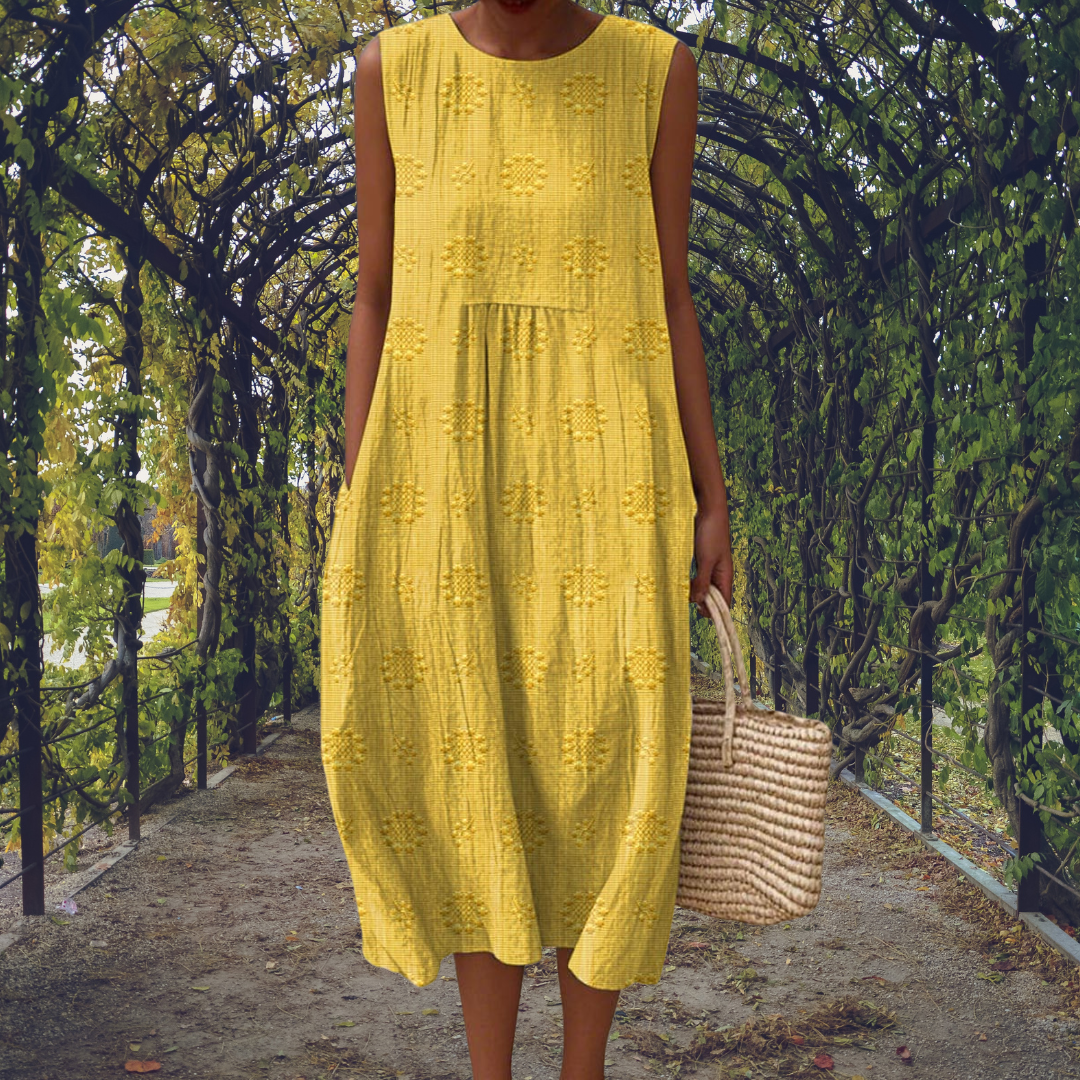Robe sans manches élégante Linda de Danoir Paris en vert, vue de face, tissu fluide et coupe sophistiquée.