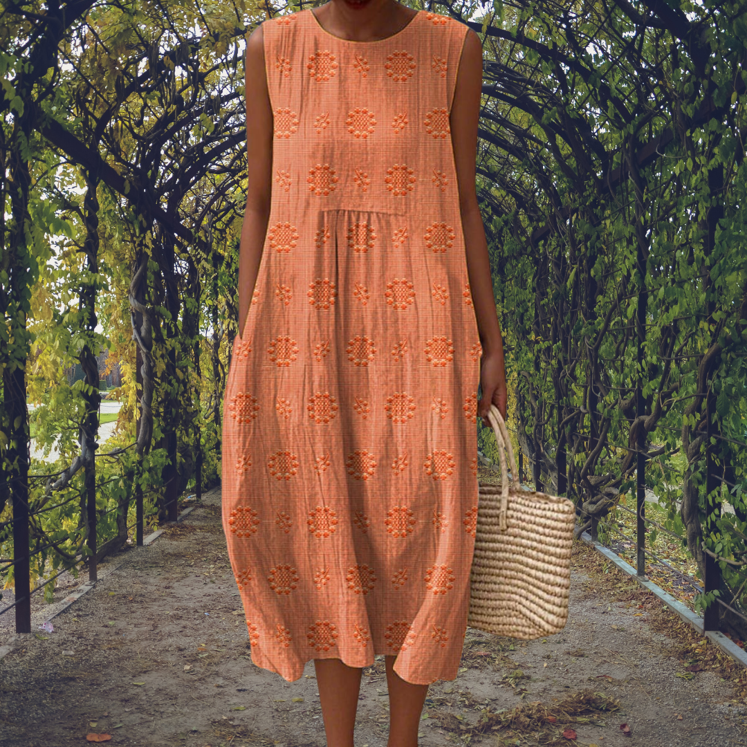 Robe sans manches Linda de Danoir Paris, élégante, en tissu vert, vue de face sur mannequin, style sophistiqué et moderne.