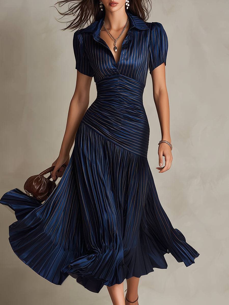 Robe satinée Manon de Danoir Paris en bleu foncé, coupe élégante et sophistiquée, pour femmes.
