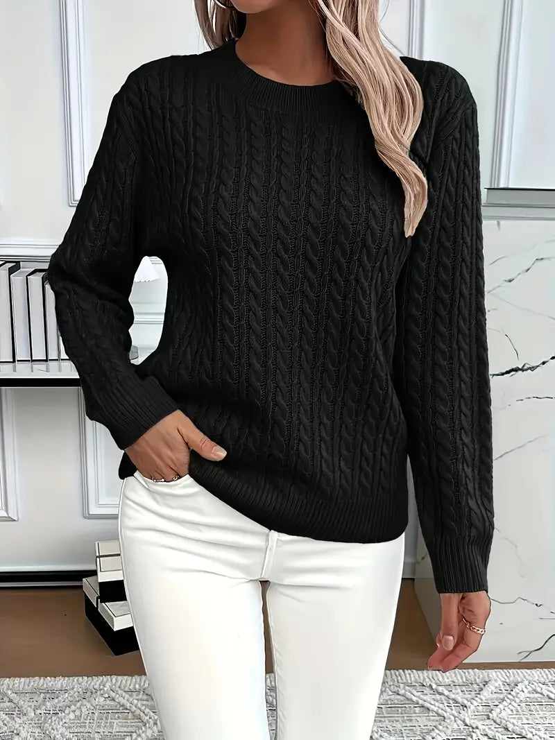 Pull en tricot à torsades blanc Lena de Danoir Paris, pour femme, détail des torsades et texture du tissu.