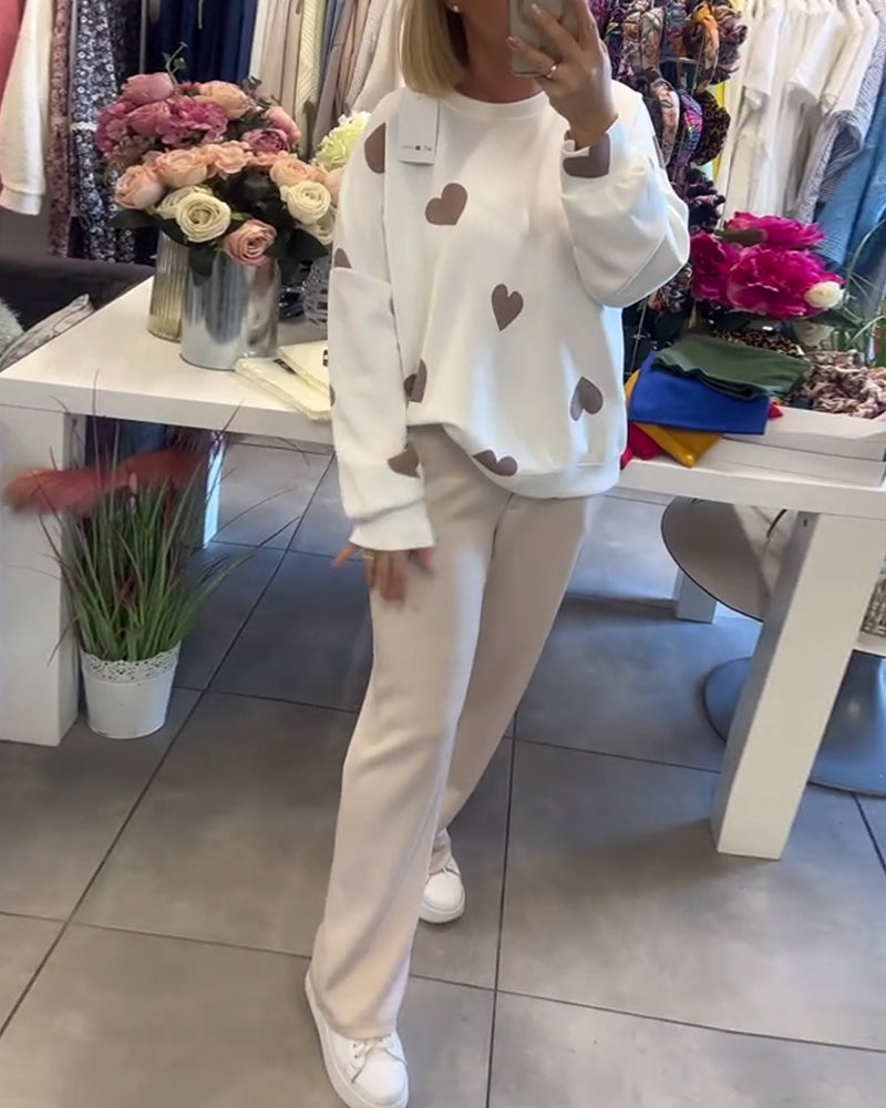 Pull Mila Danoir Paris en blanc avec motifs de cœurs, confortable et doux, version S.