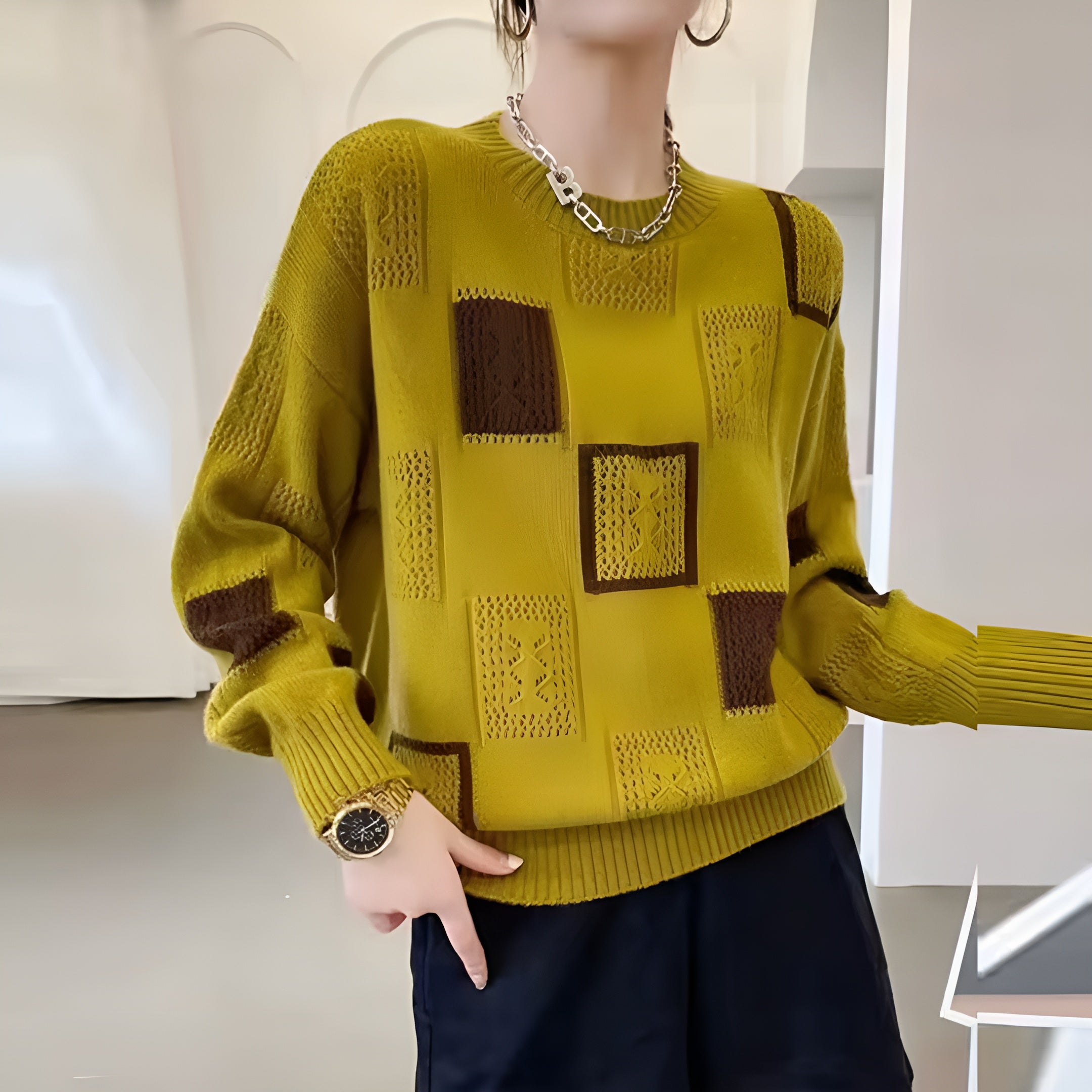 Pull aéré tendance Alida de Danoir Paris en blanc, design léger et moderne, parfait pour un look chic et confortable.