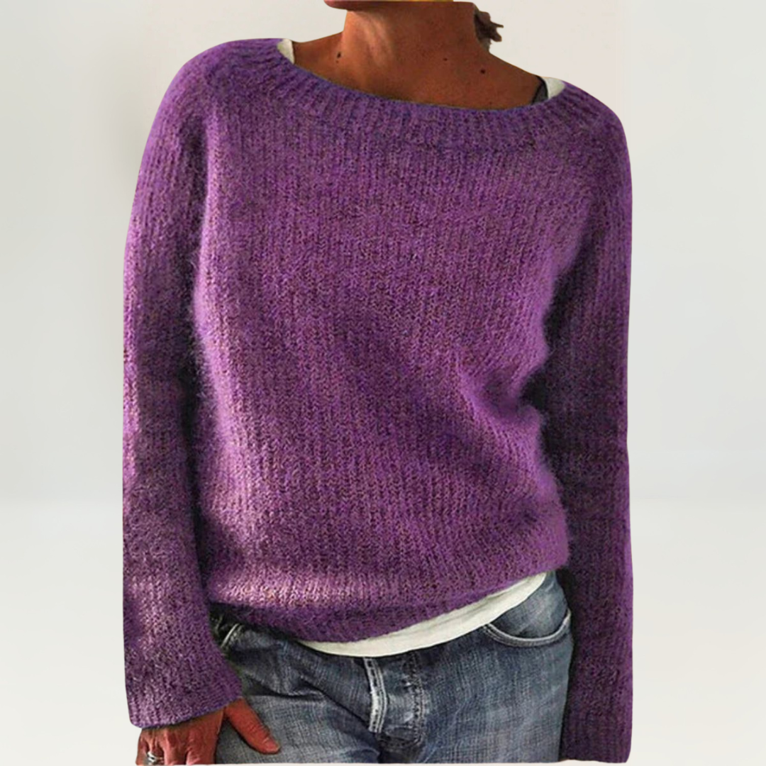 Pull orange Danoir Paris Suzy, confortable et élégant, porté en vue de face, en tissu doux et stylé.
