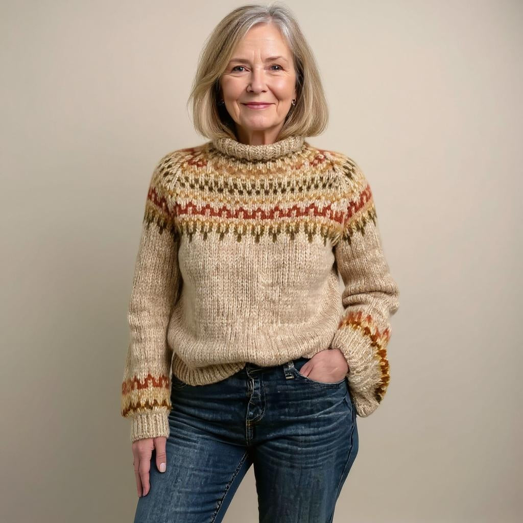 Pull islandais vintage fait main Ashley de Danoir Paris en bleu, avec motifs traditionnels et finition soignée.