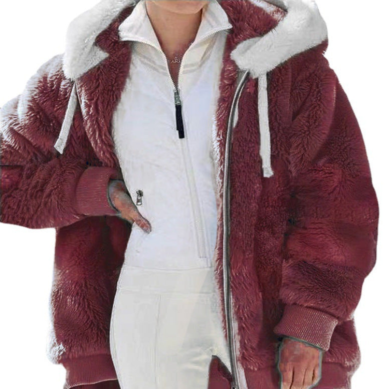 Veste d'hiver élégante Valorine de Danoir Paris avec rayures bleues, manche longue et col montant, style chic et chaud.