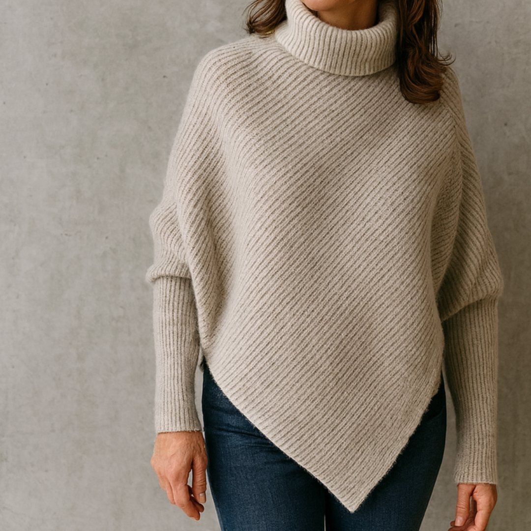 Pull poncho confortable Anneta de Danoir Paris en rouge, avec texture douce et style décontracté.
