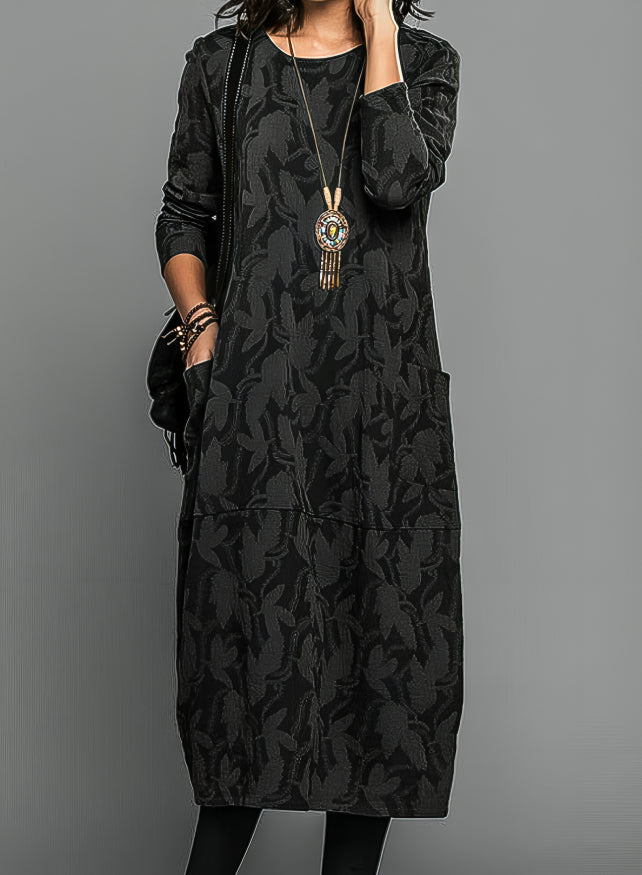 Robe d'hiver élégante Betty de Danoir Paris, en vert, coupe sophistiquée et détails raffinés, vue en gros plan.