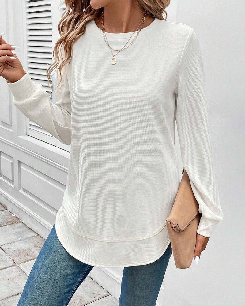 Haut doux à manches longues Alisa de Danoir Paris, blanc, style élégant et confortable, image montrant le tissu et la coupe.