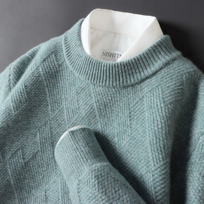 Pull Elliot Danoir Paris en cachemire doux beige, coupe classique, col rond et manches longues, parfait pour un style élégant et confortable.