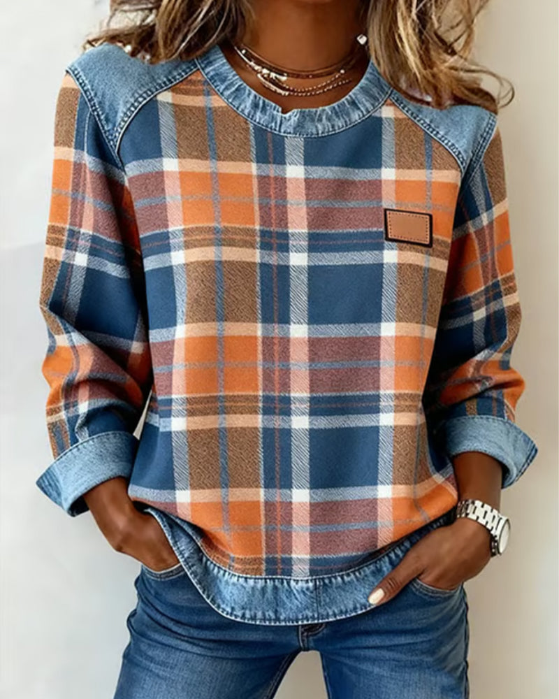 Sweatshirt patchwork orange Célia de Danoir Paris, style audacieux, vue de face avec détails colorés et motifs modernes.