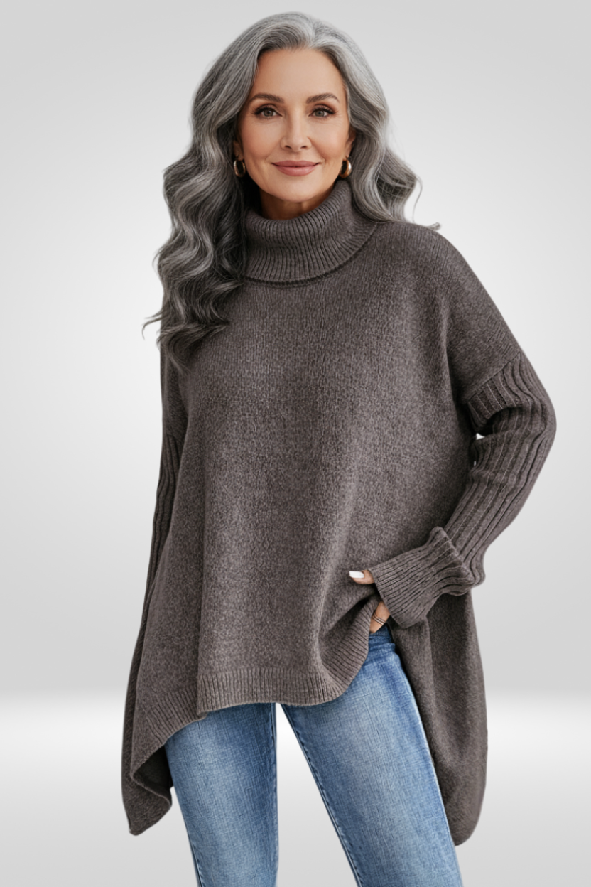 Pull asymétrique chic Danoir Paris Isabelle en beige, détail mode et style élégant pour femme.