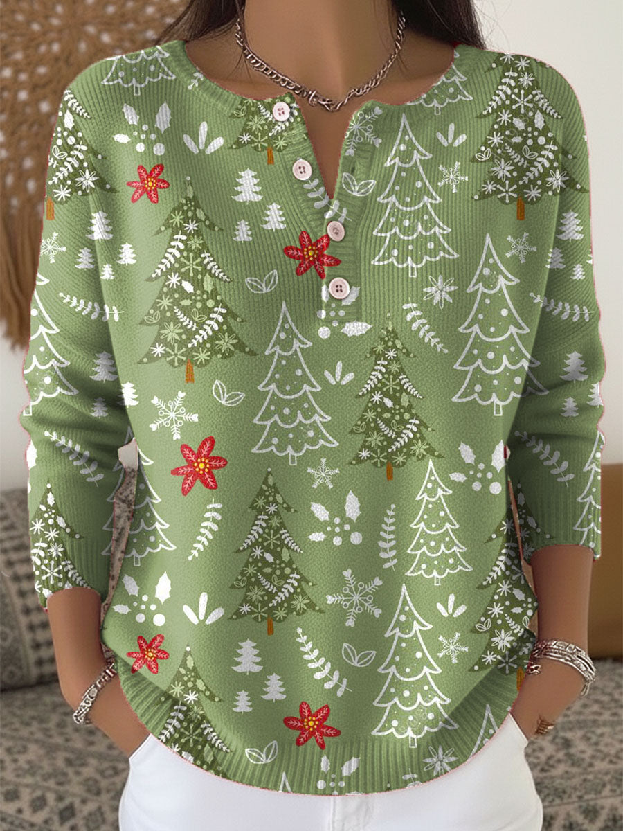 Pull de Noël festif Sofie de Danoir Paris, en vert, avec motif de saison, idéal pour célébrations hivernales.