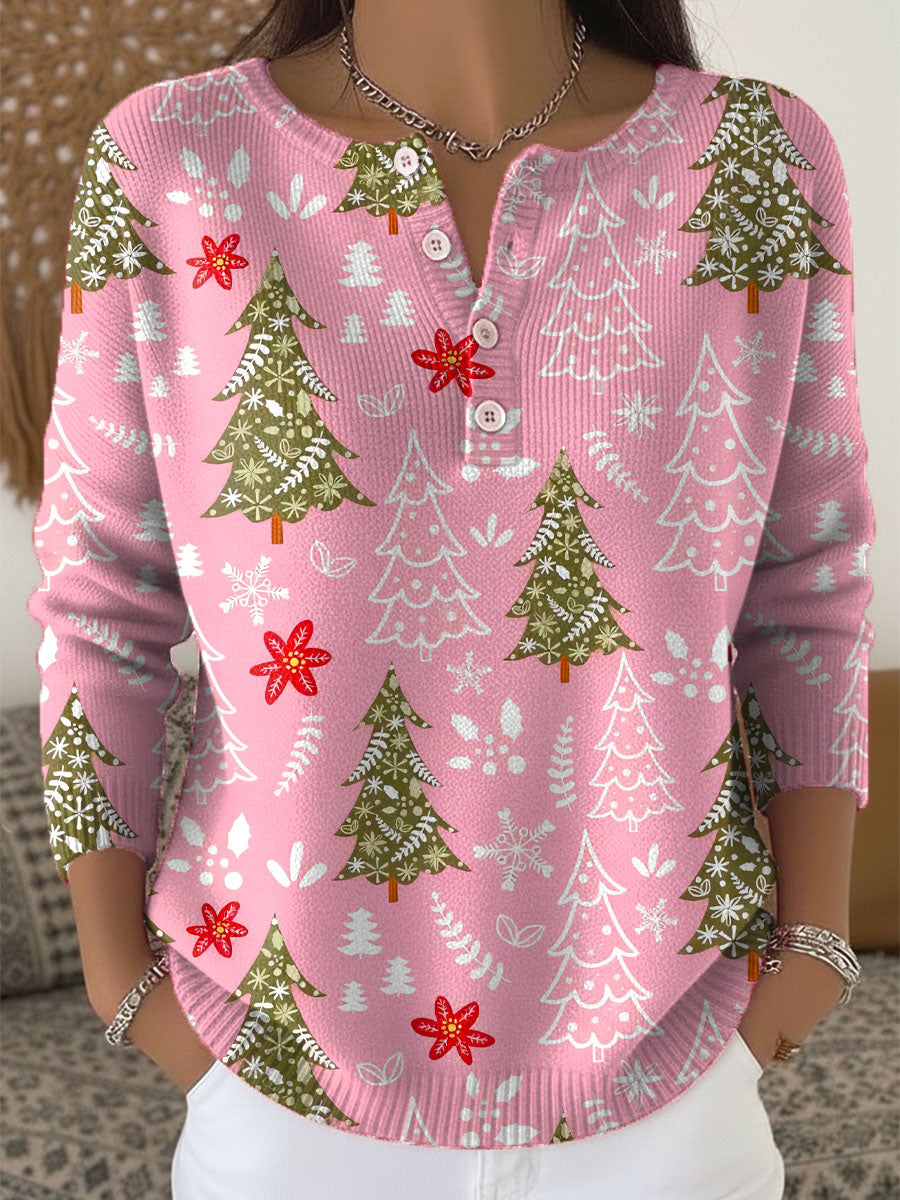 Pull de Noël festif Sofie de Danoir Paris, en vert, avec motifs de fête, manches longues, style confortable et tendance.
