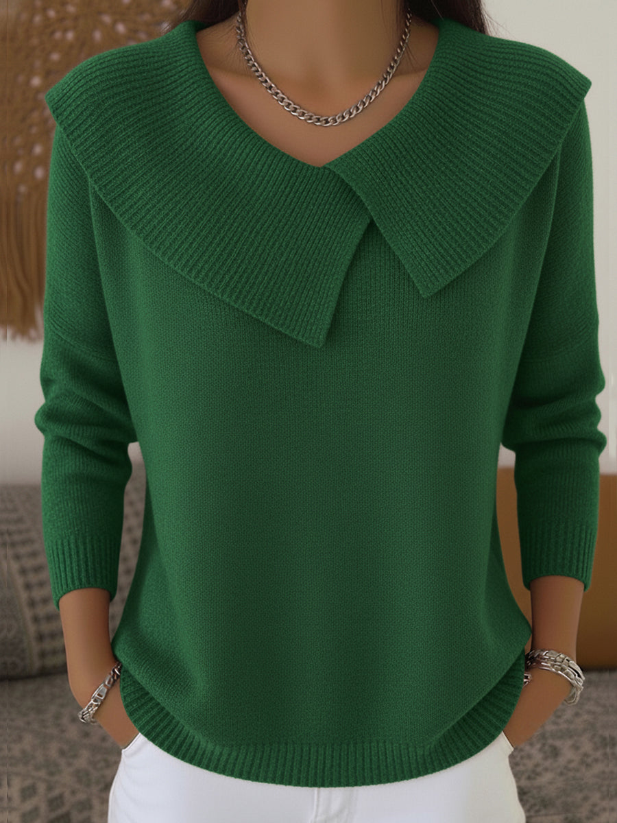 Pull doux d'hiver Lucia de Danoir Paris, élégant, rouge, en laine, porté par un mannequin dans une tenue hivernale.