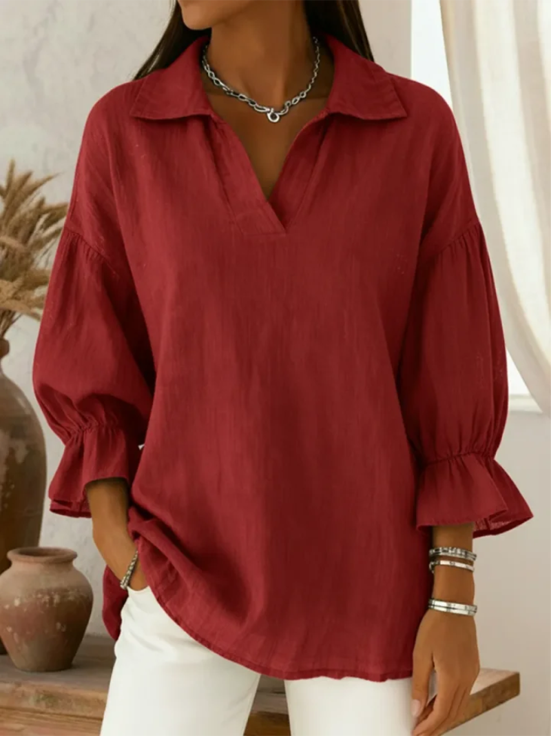 Blouse rouge Danoir Paris Mara, élégante et douce, avec manches longues et détail en tissu léger.