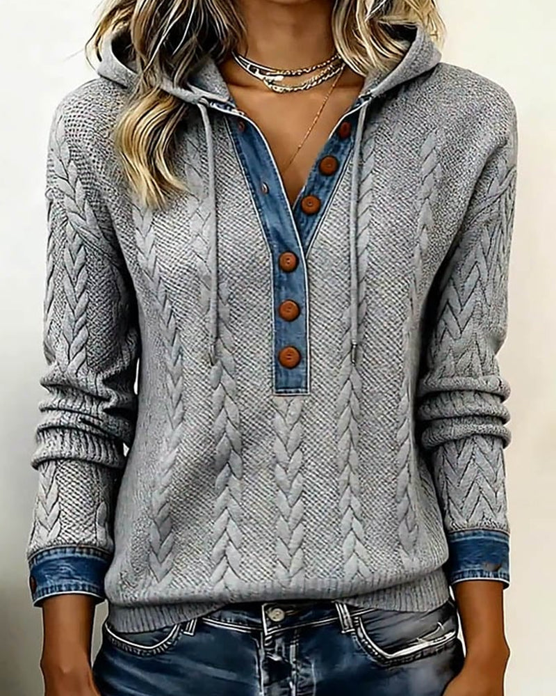 Sweat à capuche décontracté Jenny de Danoir Paris, gris, en tissu doux, porté par une femme.