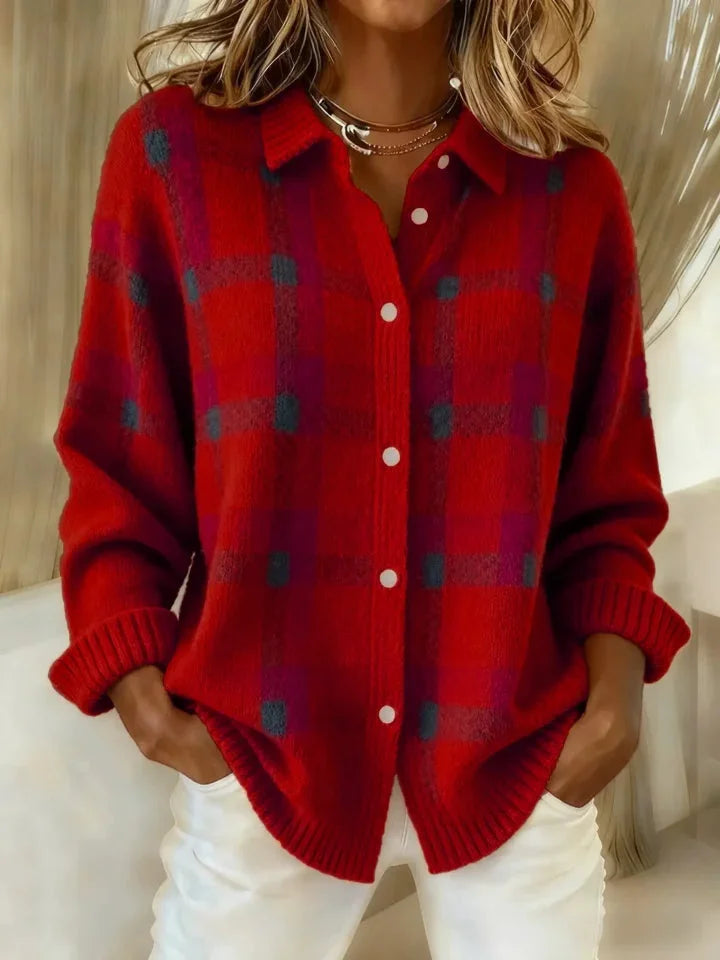 Pull douillet à carreaux orange Amelia de Danoir Paris, tissu chaud et confortable pour un style élégant.