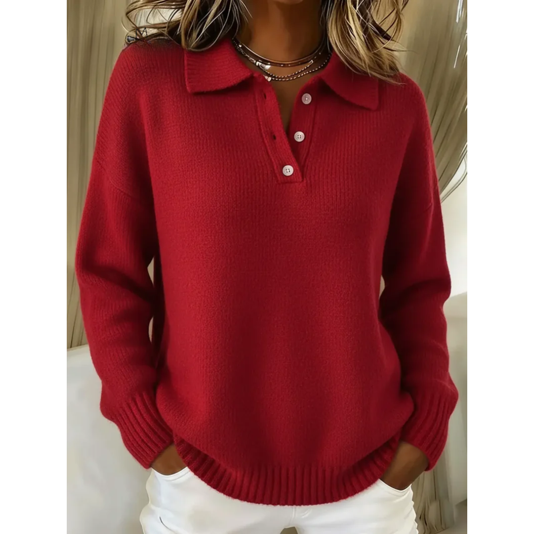 Pull polo élégant Clara de Danoir Paris en bleu, près d'être épuisé, tissu doux et finition soignée.