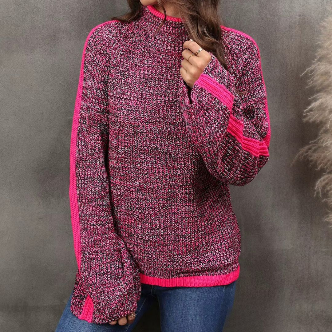 Pull patchwork chic Danoir Paris Diana en orange, style tendance, tissu doux et détails patchwork visibles.