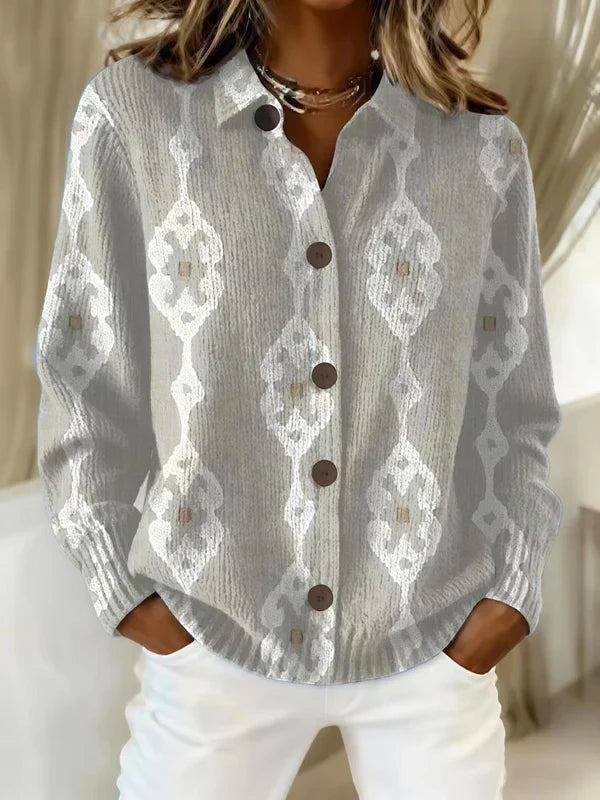Cardigan long élégant Danoir Paris Elisa en beige et marron avec motif floral, tissu doux et finition sophistiquée.
