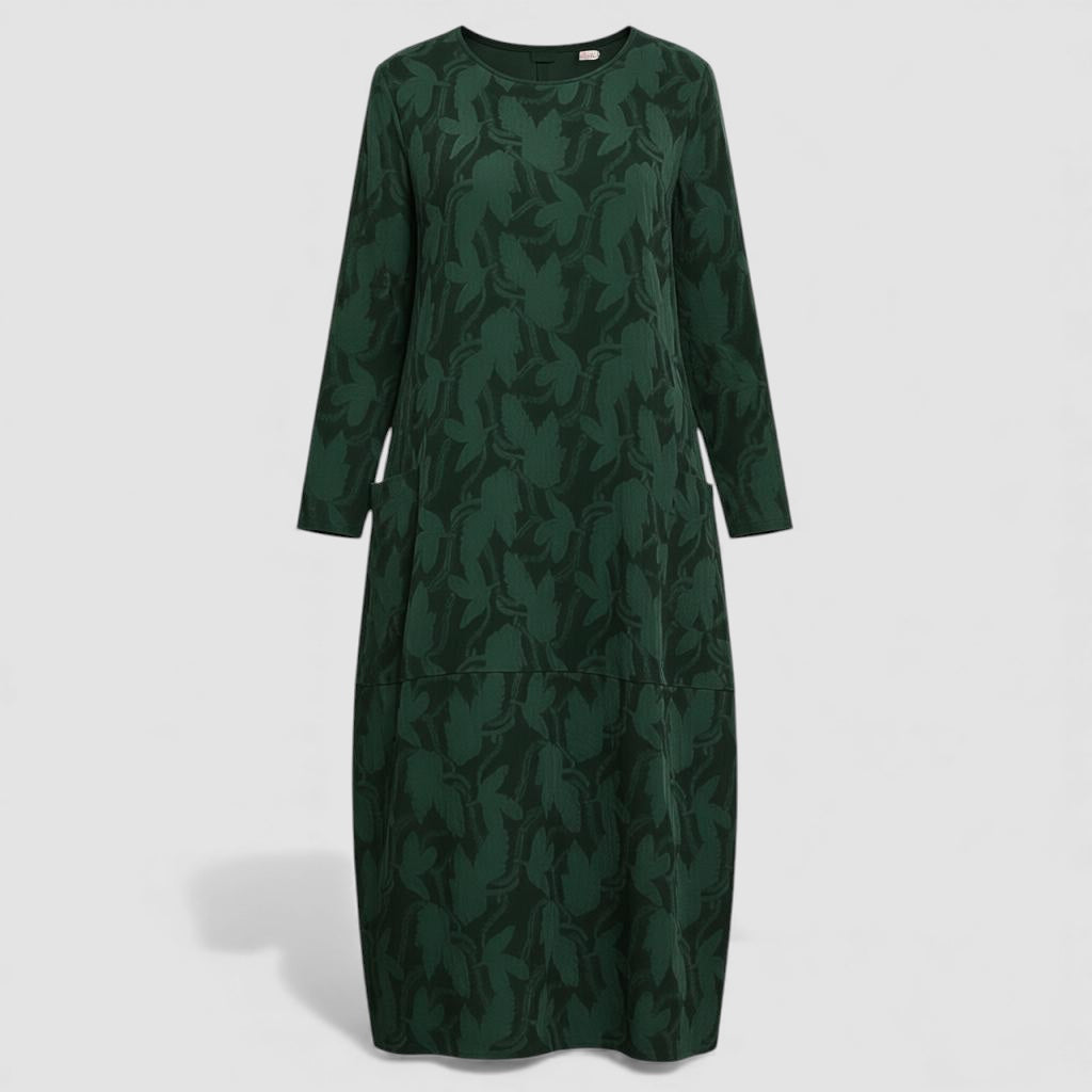 Robe aérée élégante Danoir Paris Elvane en tissu vert léger, style sophistiqué et confortable pour une occasion spéciale.