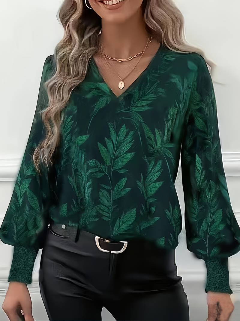 Blouse élégante Ruchama de Danoir Paris avec imprimé feuilles vert, style sophistiqué et tissu léger, pour femme.