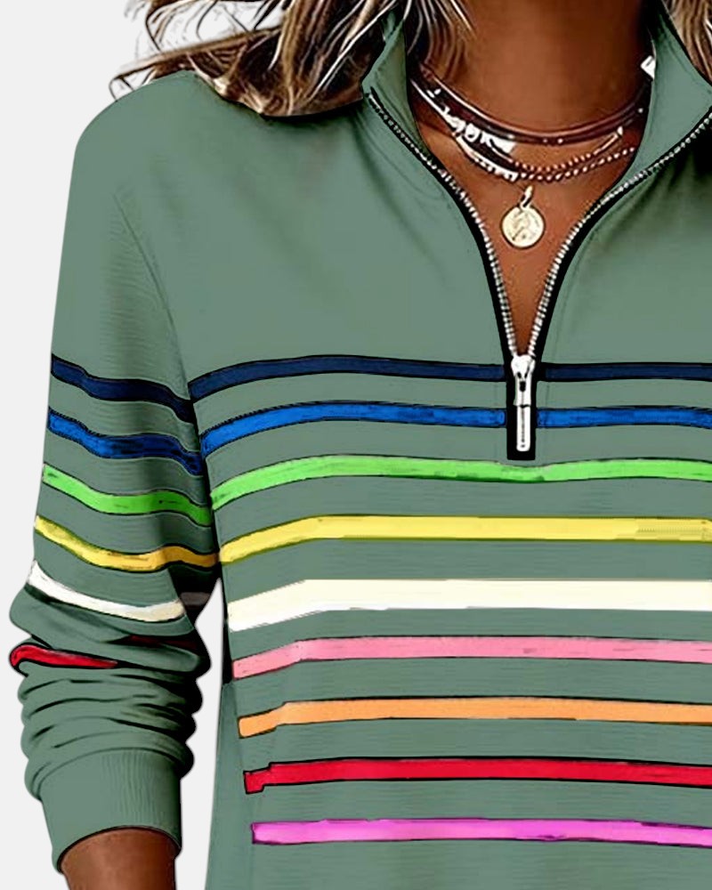 Pull confortable à rayures Nina de Danoir Paris, en gris, avec motifs rayés, doux et tendance pour un look décontracté.
