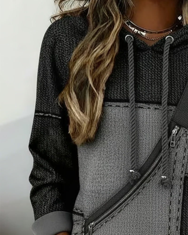 Sweat à capuche Rosita Danoir Paris en color block urbain gris foncé, détails de style moderne et look tendance.