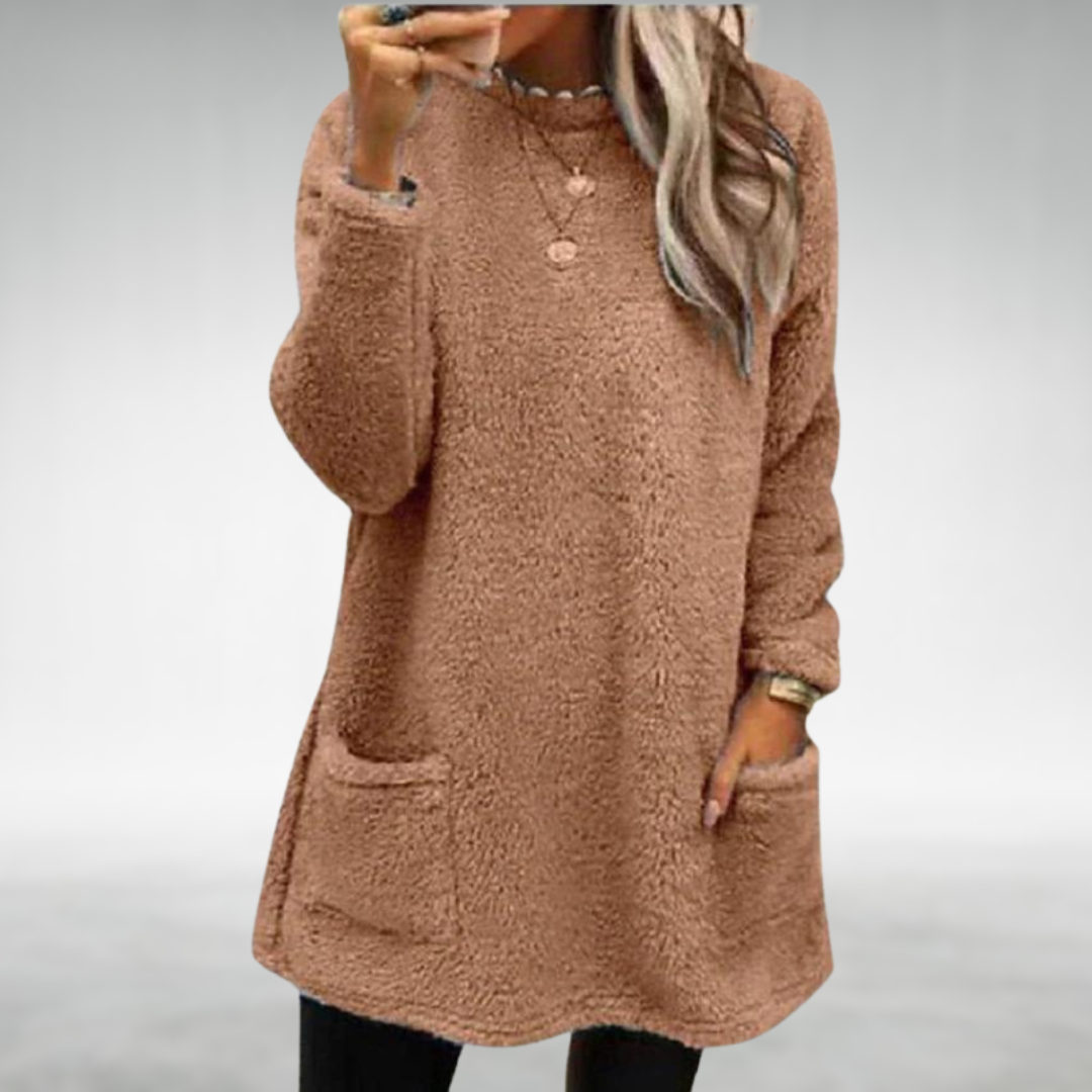 Pull Nora Danoir Paris en rose, doux et chic, avec un design élégant et confortable pour un style moderne.