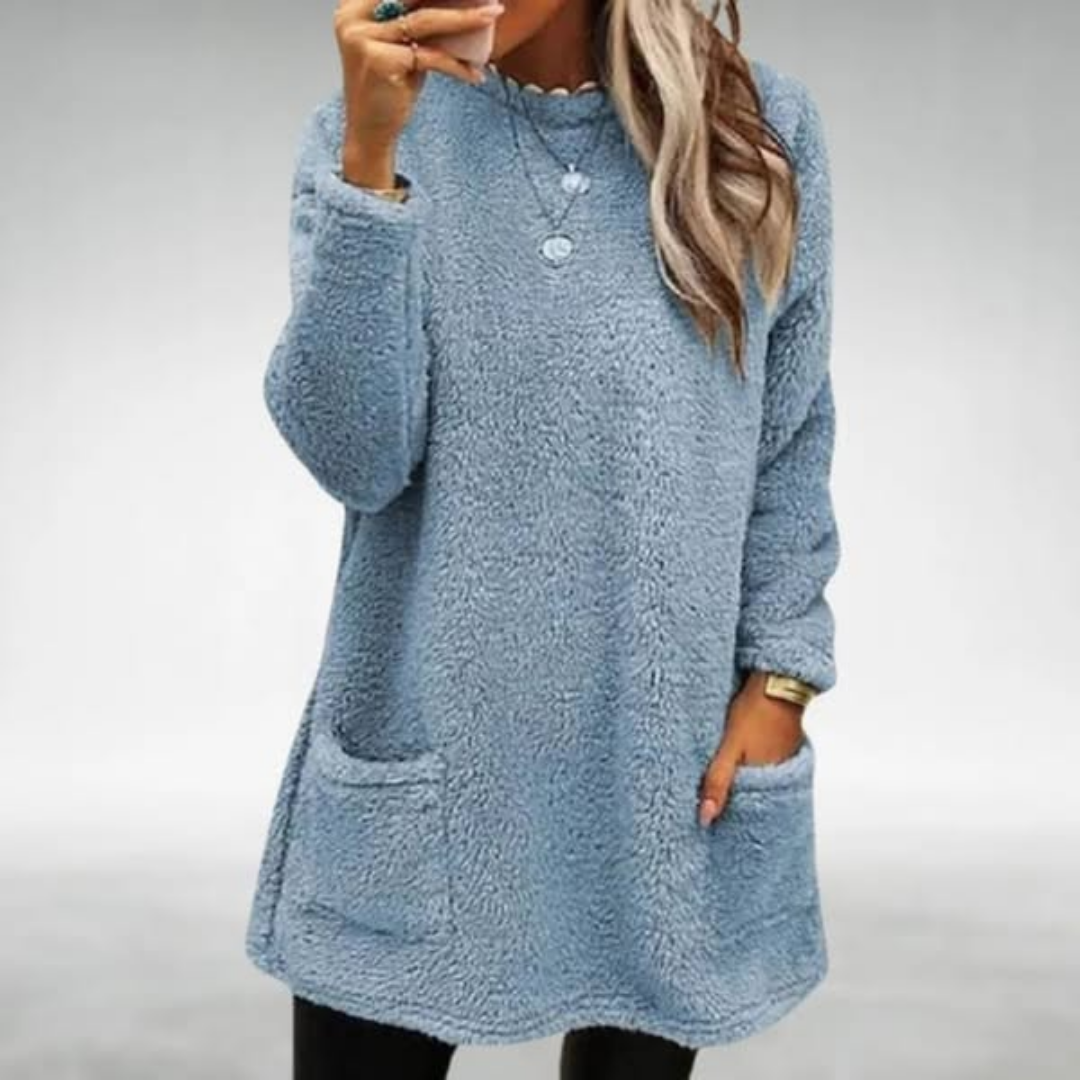 Pull Nora Danoir Paris en rose, doux et élégant, avec un style chic et confortable, parfait pour un look tendance.