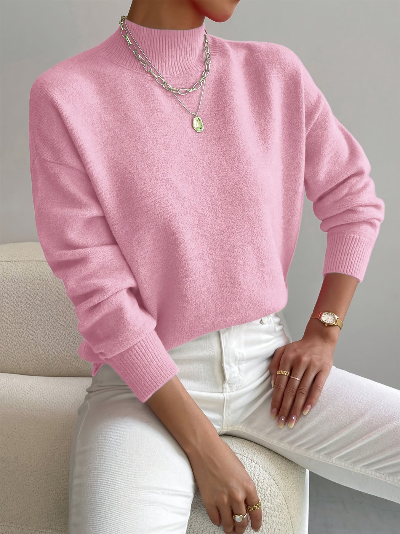 Pull blanc Danoir Paris Yvonne, élégant et chaud, avec un design classique et confort visible sur l'image.