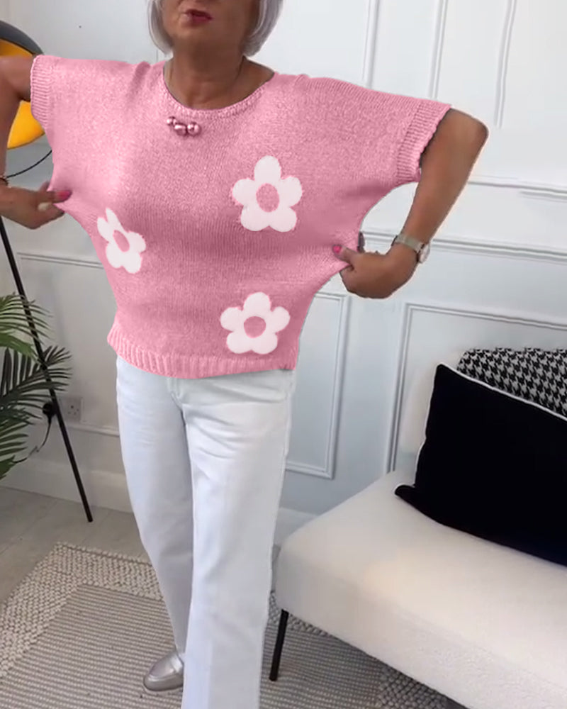 Pull gris Danoir Paris Daisy, élégant à motifs floraux, en tissu doux, porté sur un mannequin.