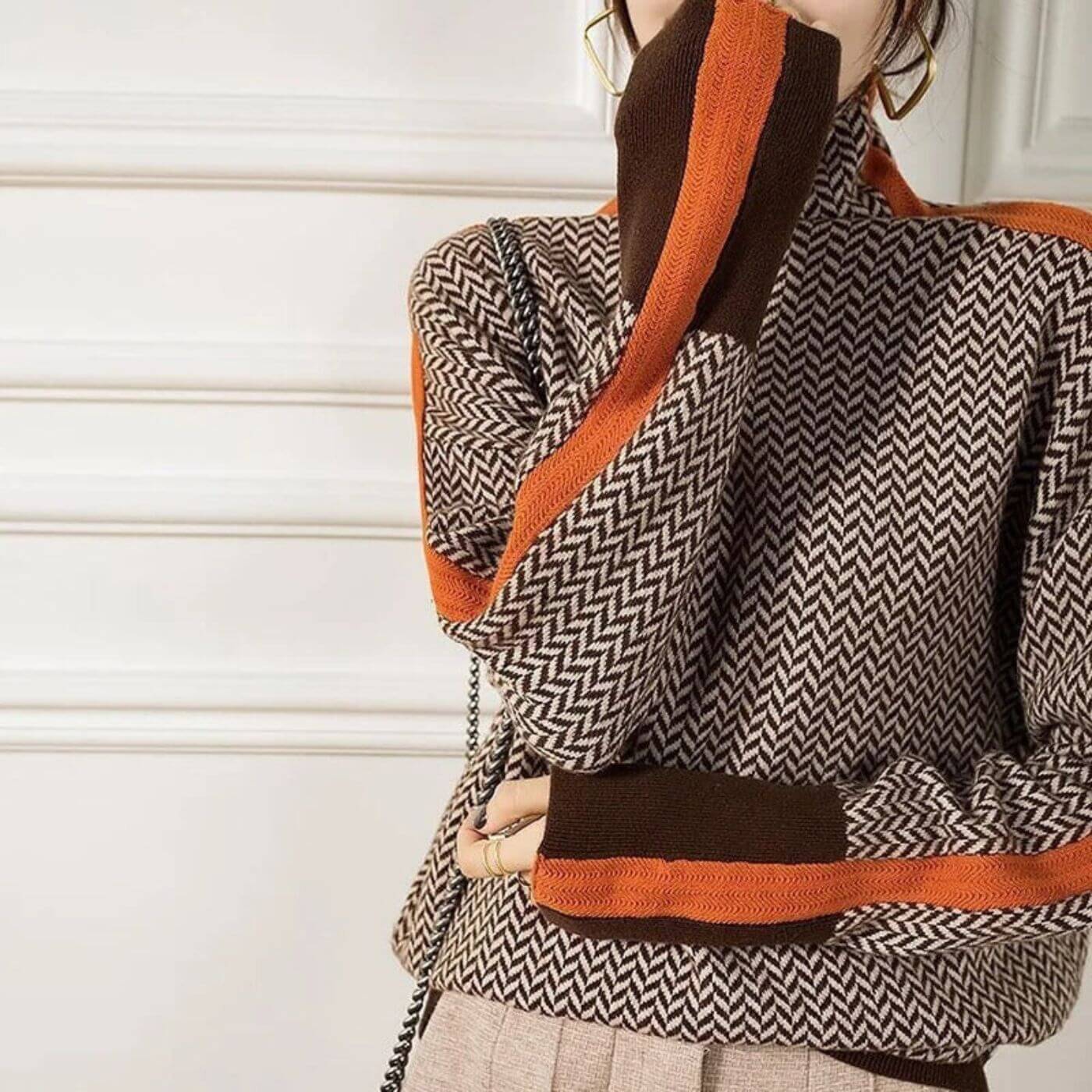 Pull roulé orange Danoir Paris Leni en chevrons, style chic, manche longue, douceur et élégance pour femme.