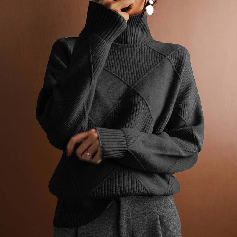 Pull douillet et élégant Sara de Danoir Paris, couleur beige, avec une texture douce et confortable visible sur l'image.