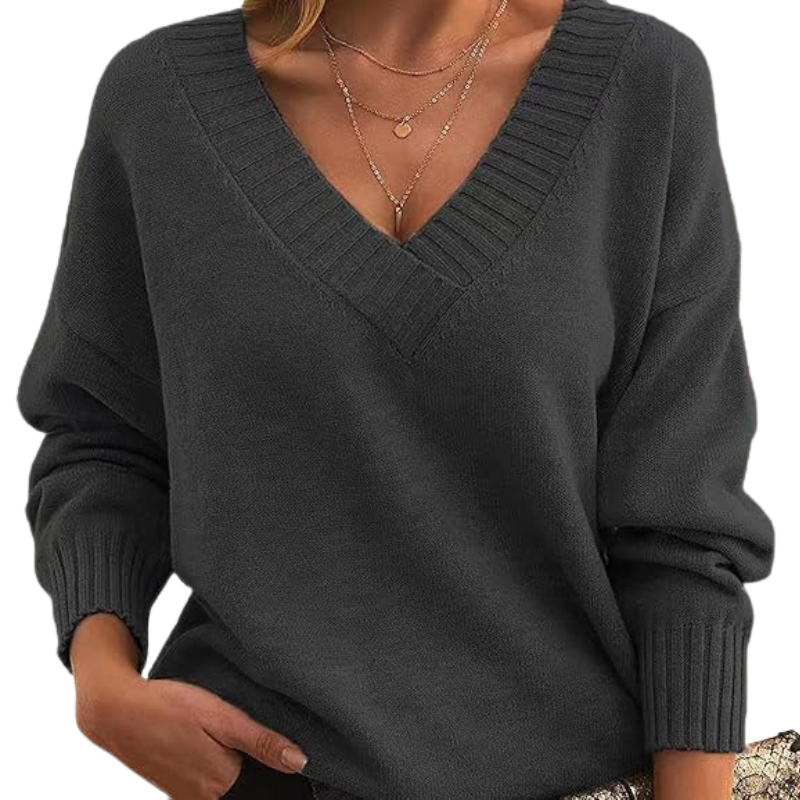 Pull élégant en mélange de cachemire de la marque Danoir Paris, couleur abricot, modèle Lenia, porté sur un mannequin.