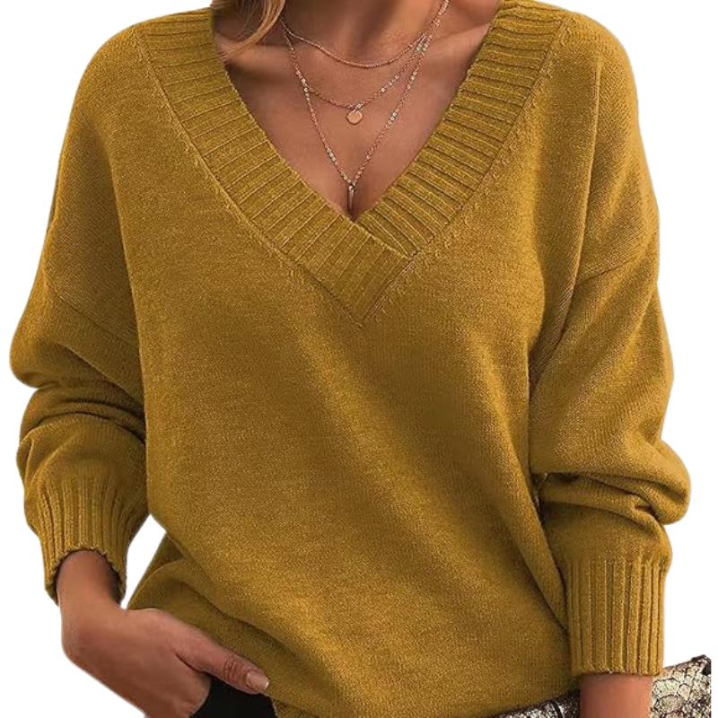Pull élégant en mélange de cachemire Danoir Paris Lenia de couleur abricot, porté sur mannequin.