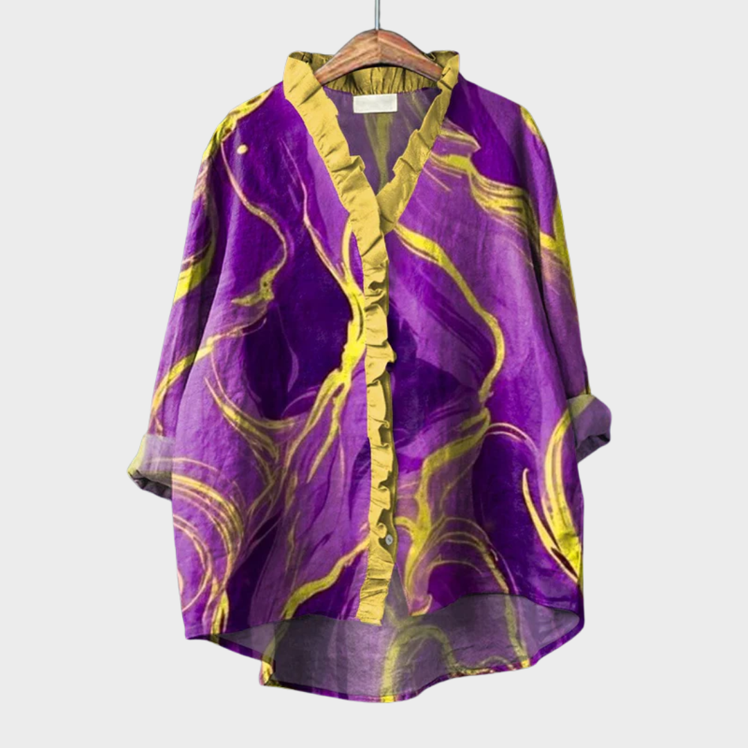 Blouse d'été en lin jaune et violet de la marque Danoir Paris, élégante et légère, portée sur une mannequin.