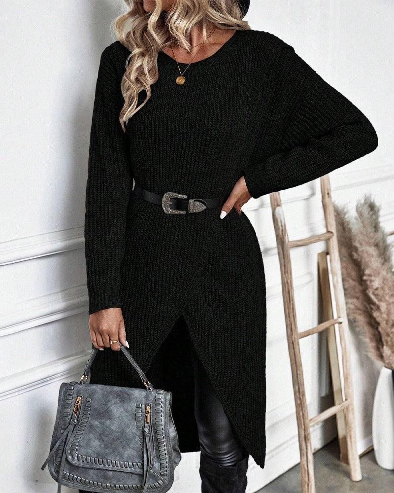 Pull long élégant Brigit de Danoir Paris, en gris, avec un design sophistiqué et finition soignée, porté dans un style chic.