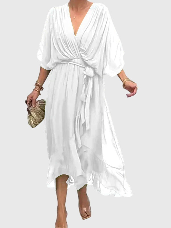 Robe élégante Bethany verte de Danoir Paris, coupe fluide, manches longues et décolleté en V, portée élégante et sophistiquée.