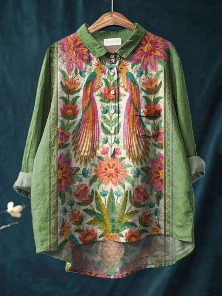 Chemise tropicale Nina de Danoir Paris avec motif paon coloré, manches longues et col élégant, vue de face.