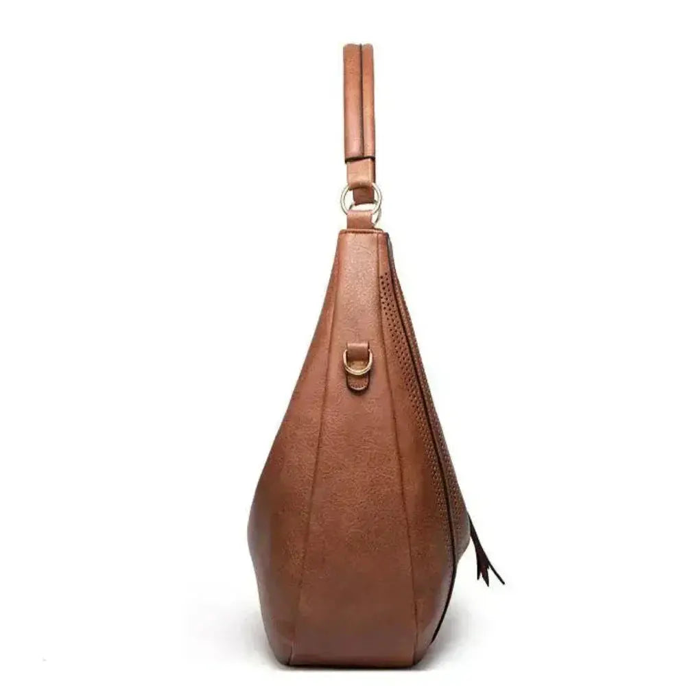 Sac vintage Danoir Paris Anya en gris, sac à main intemporel et polyvalent avec design élégant et classique.