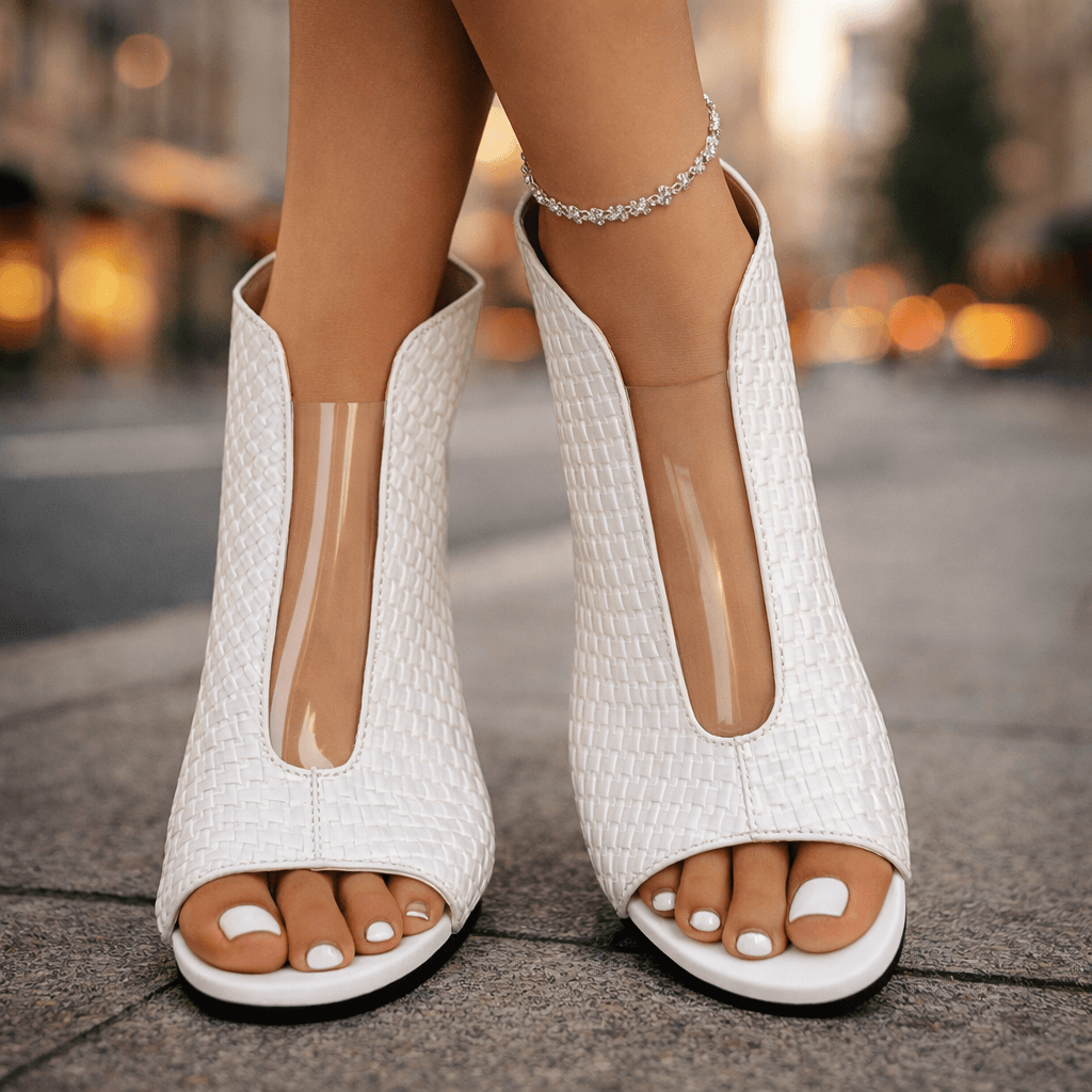 Escarpins Danoir Paris ZOÉ en argent à talons sculptants, vue de face, mettant en valeur leur design élégant.