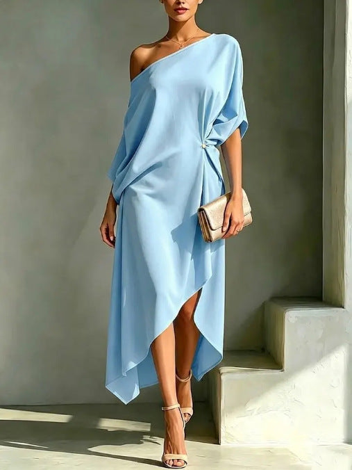 Robe élégante asymétrique jaune Camila de Danoir Paris, vue de face, en tissu fluide et design moderne.