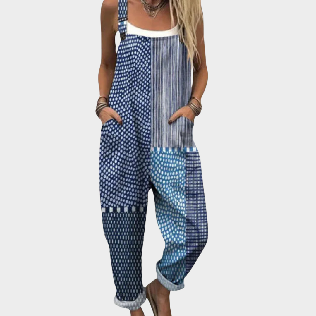 Salopette imprimée confortable de Danoir Paris, vêtement style jumpsuit bleu avec motifs, visible en détail.