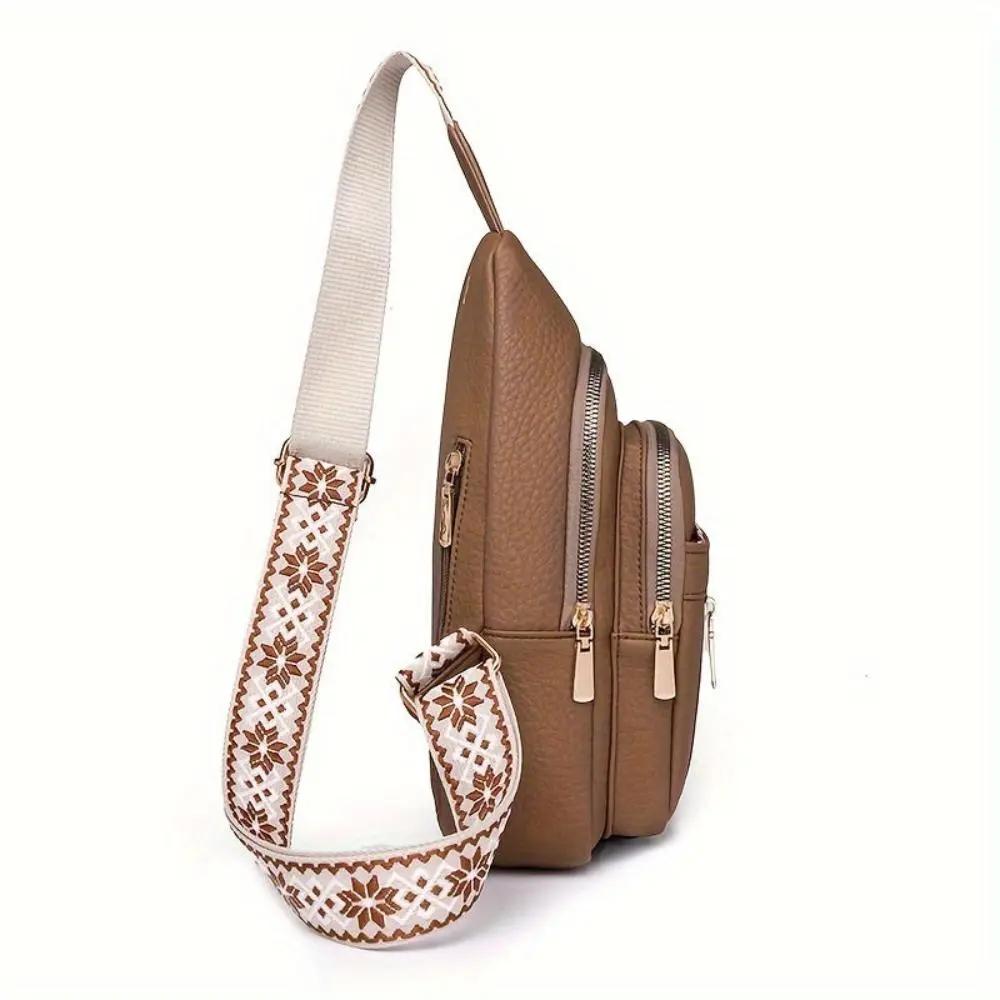Sac à bandoulière Fiona de Danoir Paris en kaki avec roulettes, visible avec poignée et détails élégants.