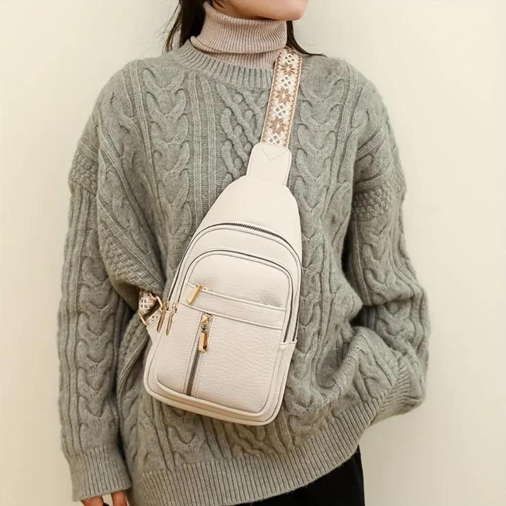 Sac à bandoulière Fiona de Danoir Paris en kaki avec roulettes, design pratique et élégant pour voyager ou transporter des affaires.