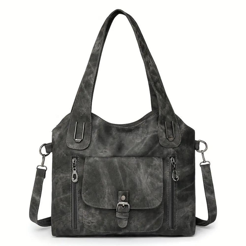 Sac à bandoulière Cecilia de Danoir Paris en cuir marron, élégant et intemporel, avec bandoulière ajustable.