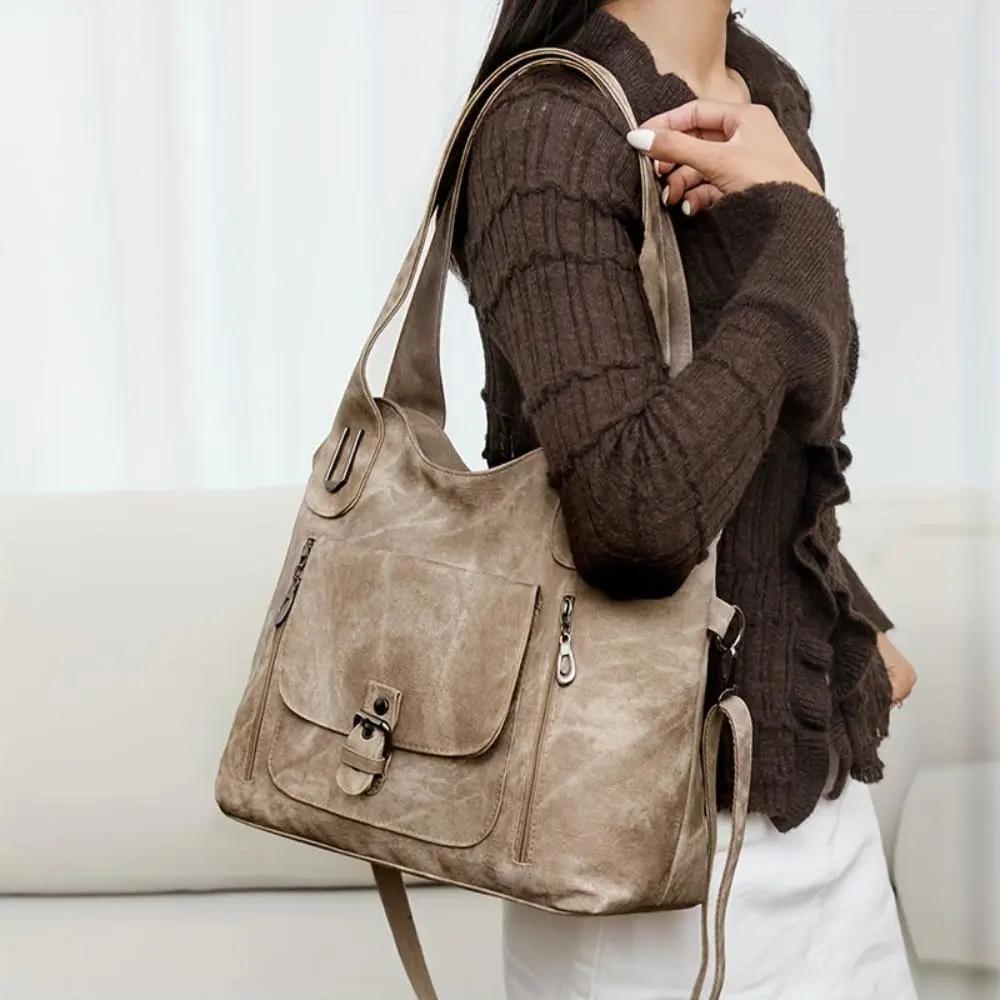 Sac à bandoulière Cecilia Danoir Paris en cuir marron, élégant et intemporel, avec bandoulière ajustable et finition soignée.